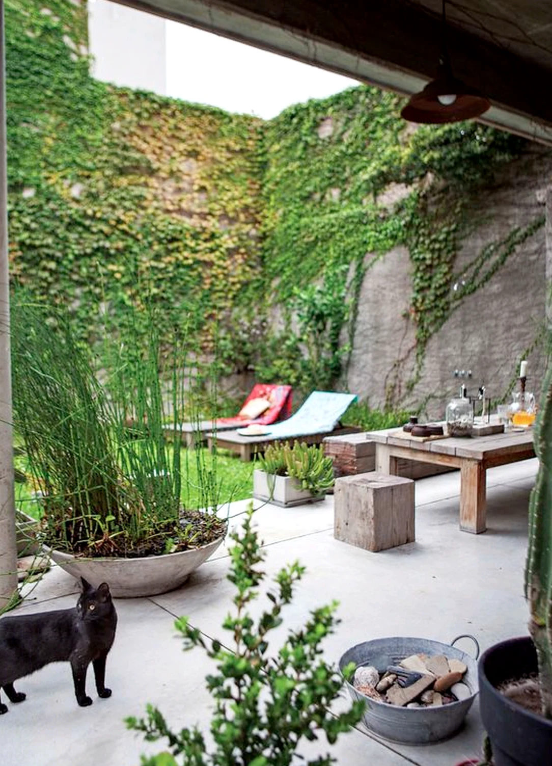 Cozy stair landing draws attention to warmth while the entry stays bright but not busy.