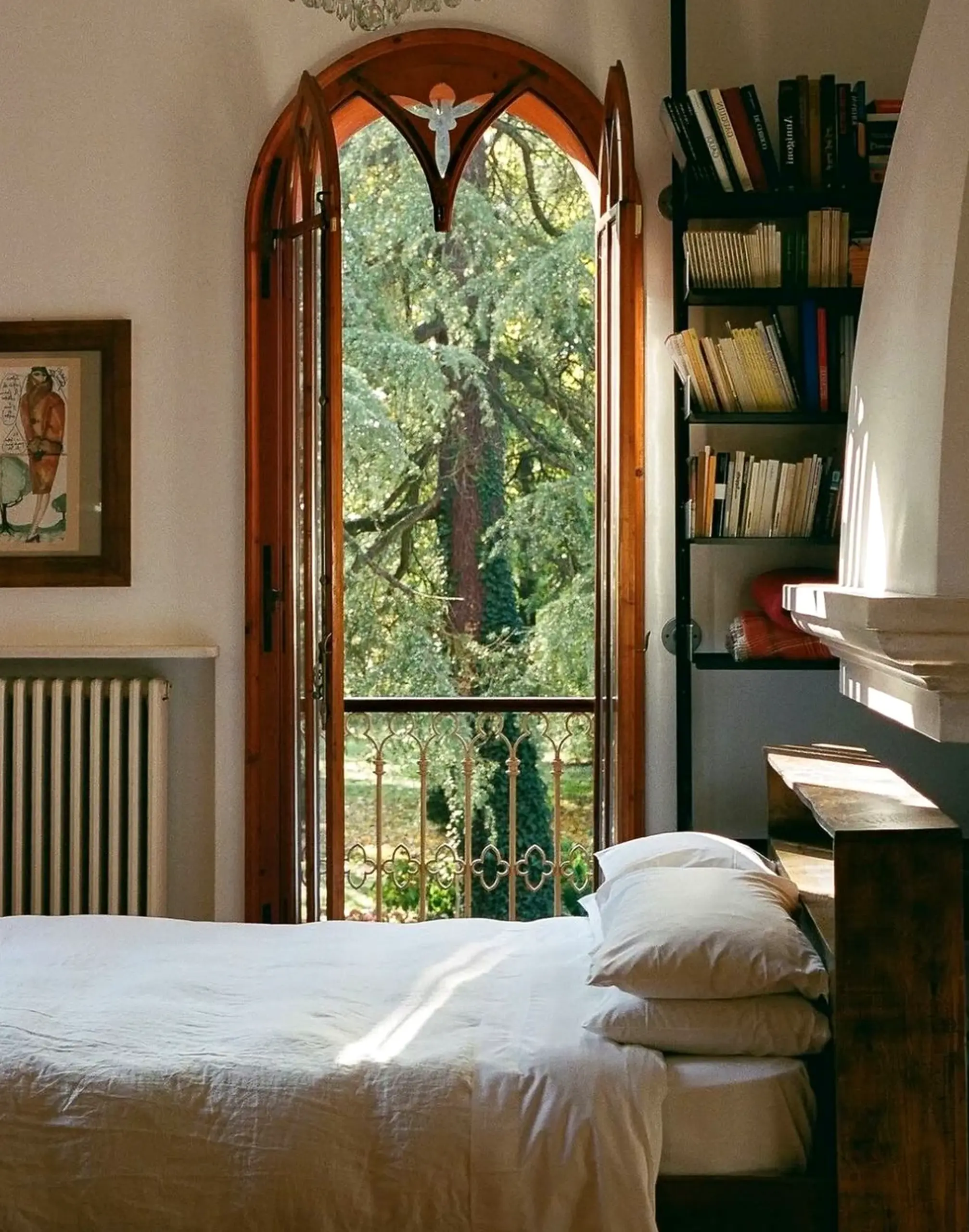 Airy wood shelving draws attention to ease while the outdoor space stays warm without clutter.