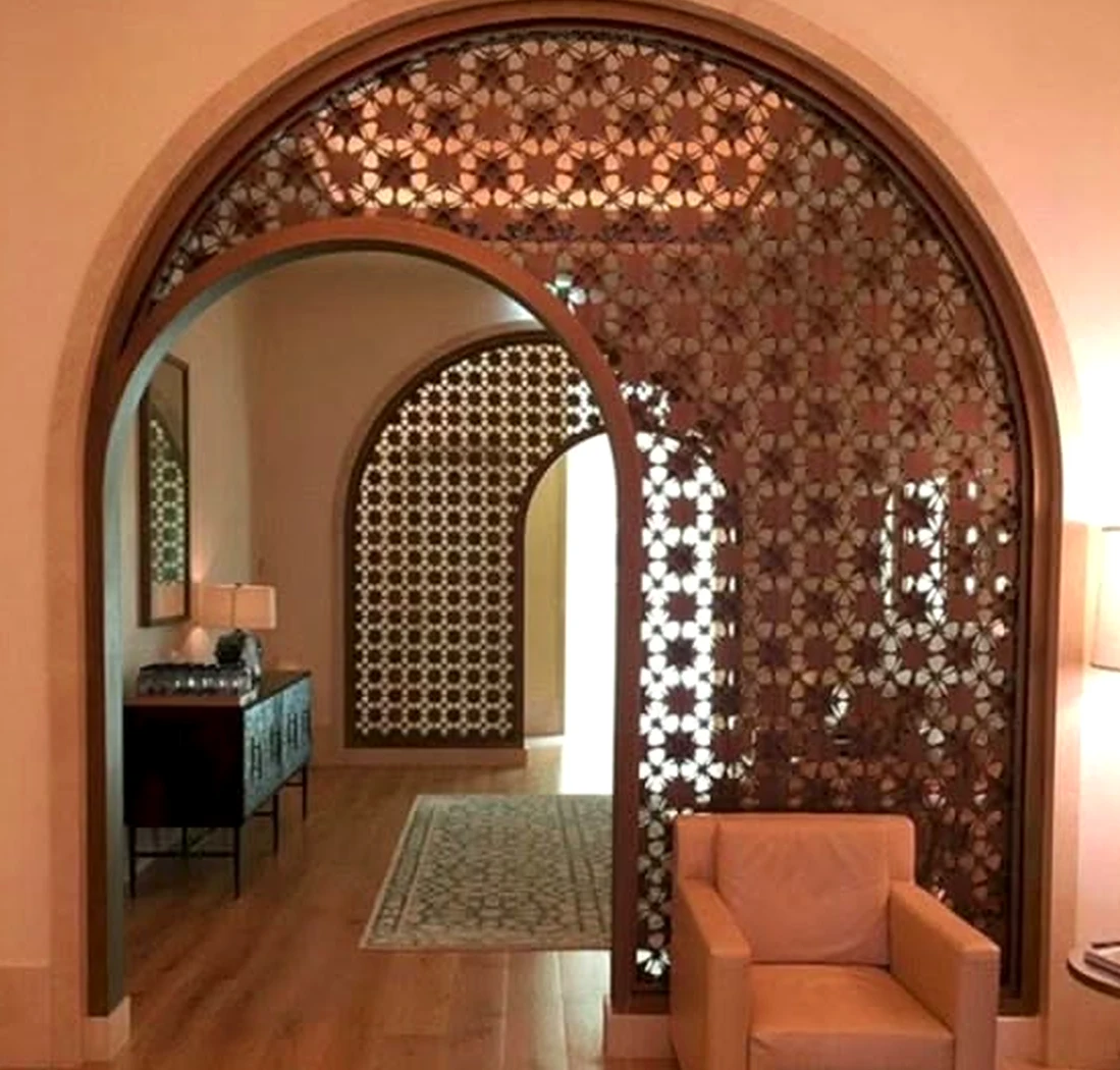 Polished cabinet wall adds warmth across the sitting area, giving the decor a finish that feels clear and inviting.