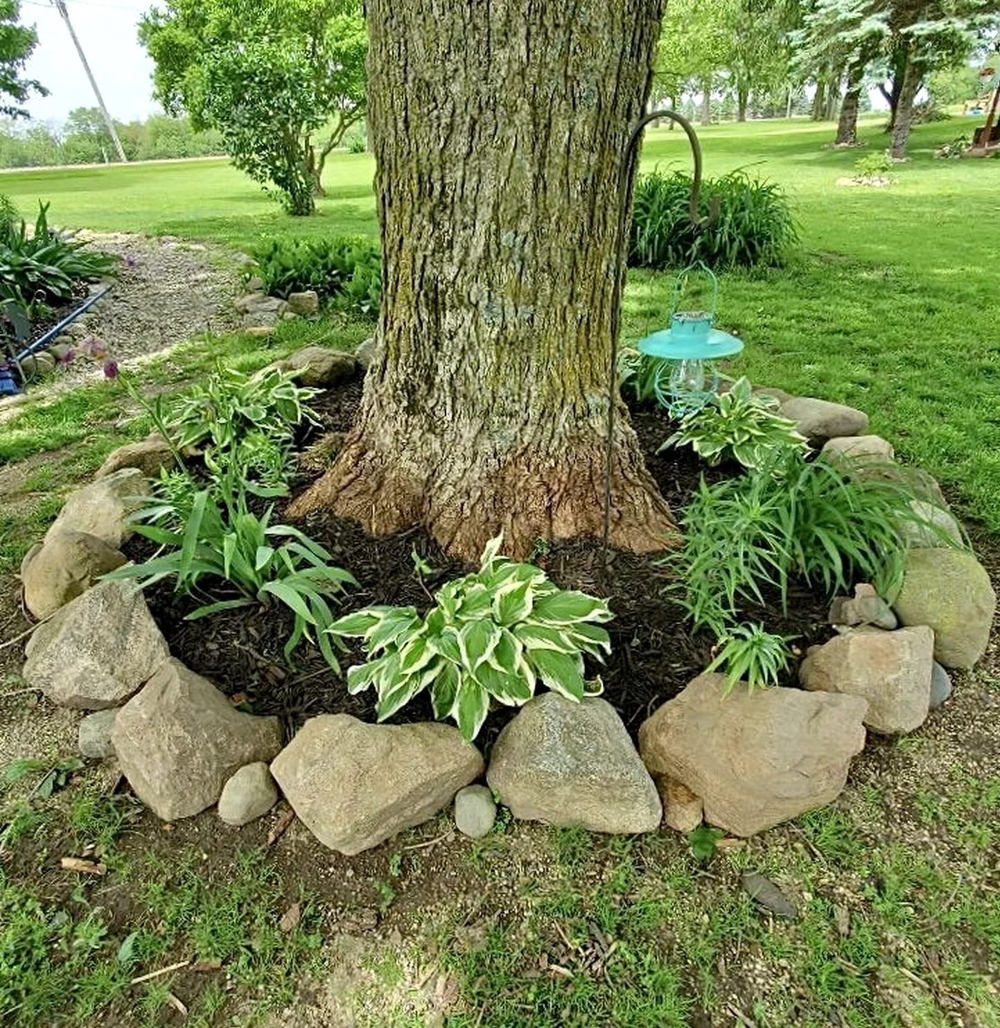 Balanced courtyard view frames the corner with texture, making the scene feel ready for quiet use.