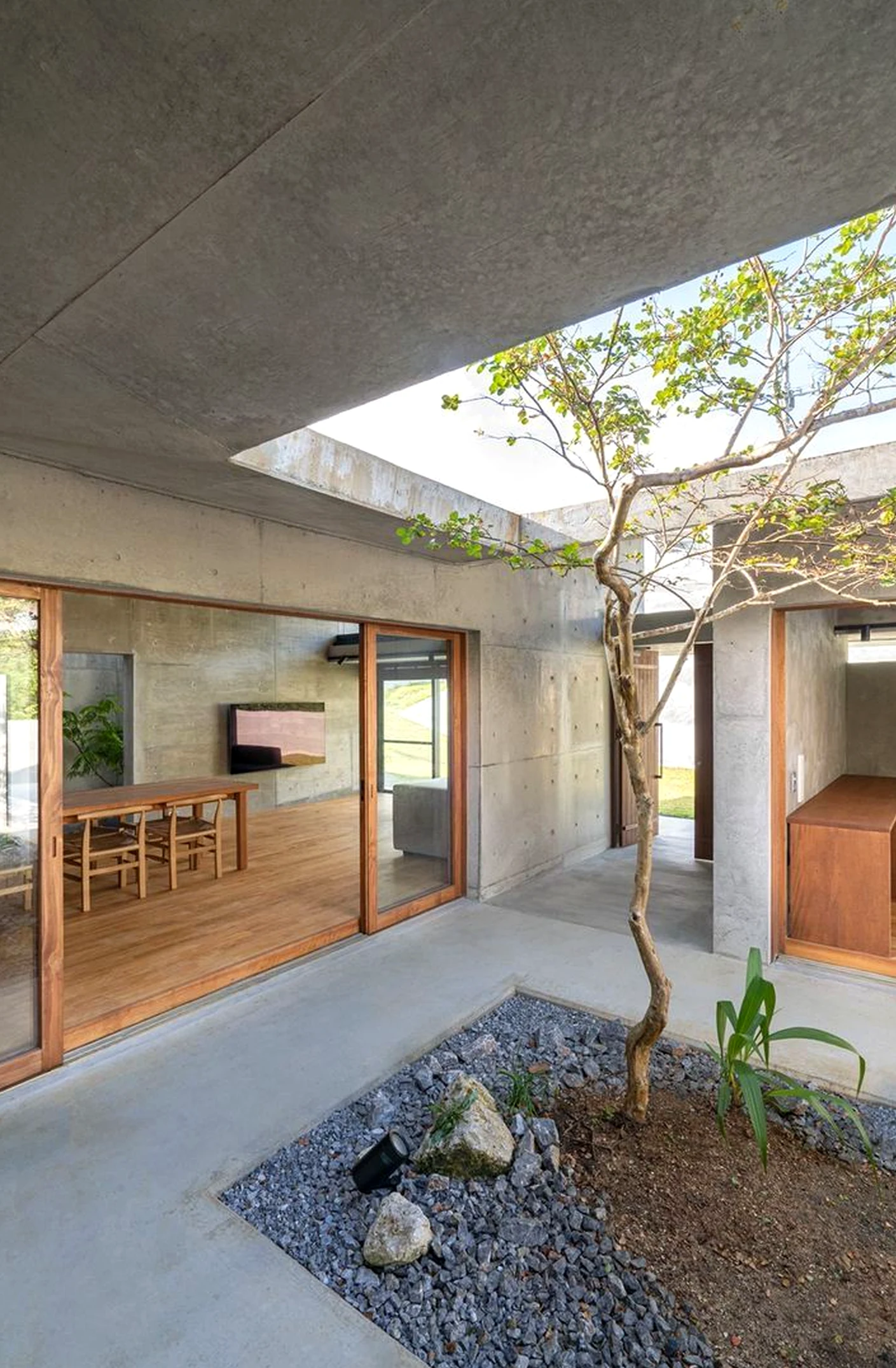 Sculptural floor pattern brings order to the backdrop, creating a mood that feels quietly finished.