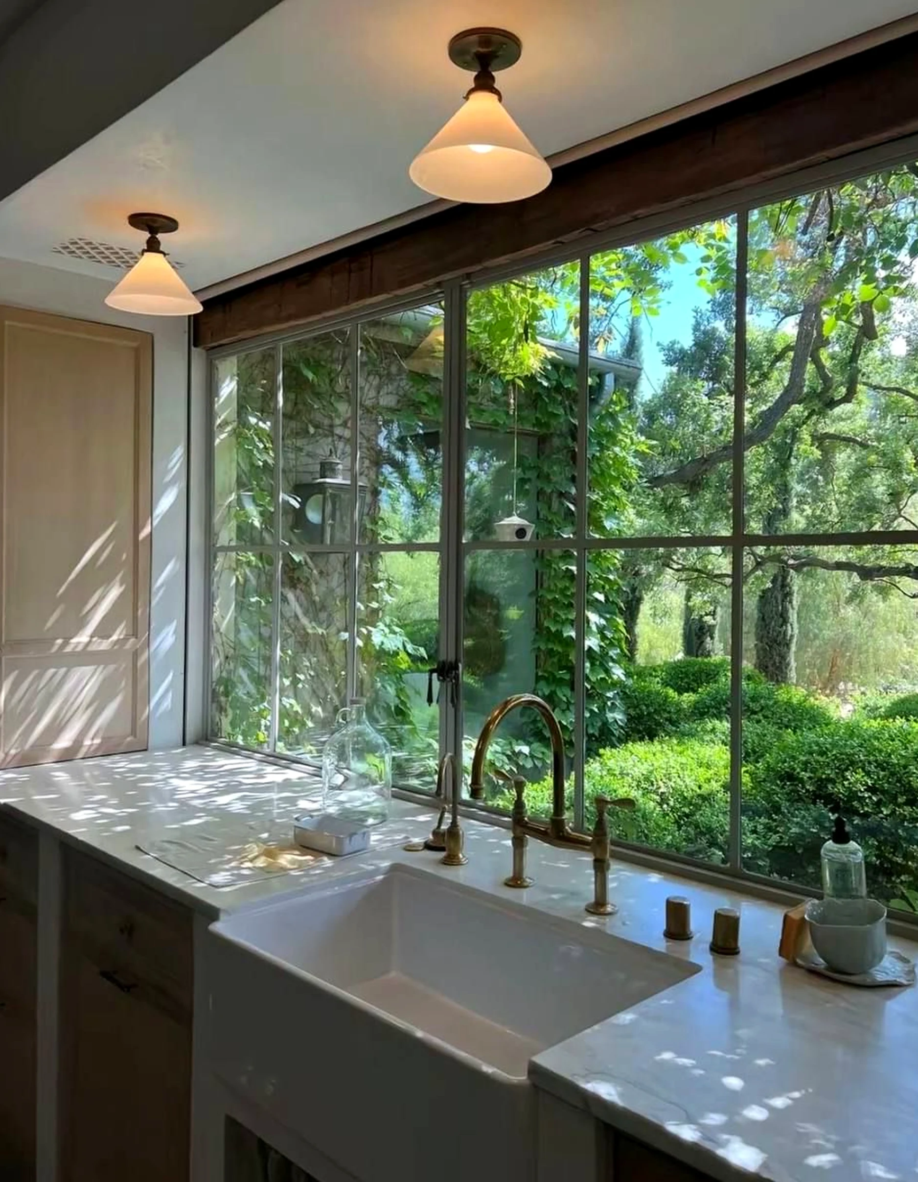 Sculptural floor pattern frames the composition with warmth, making the scene feel warm without clutter.