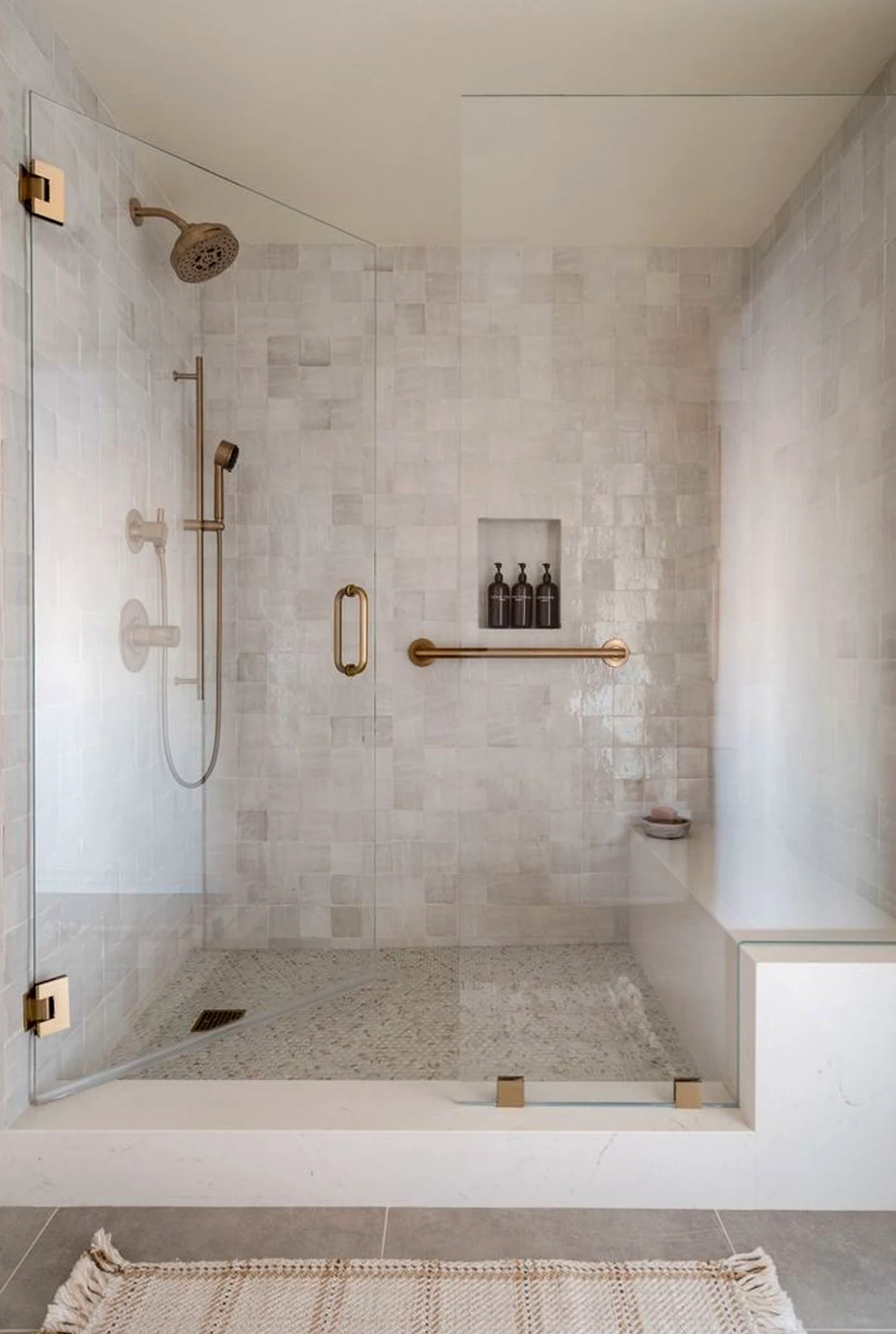 Graceful shower wall brings charm to the table, creating a mood that feels easy to enjoy.
